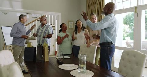 Diverse Seniors Enjoying a Casual Celebration at Home