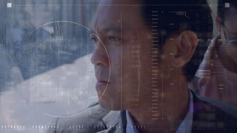 Digital interface analyzing focused businessman on bus