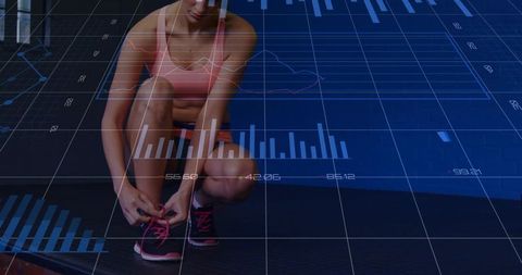 Female athlete tying running shoes with futuristic fitness data overlay
