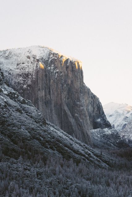 Snow-Covered Yosemite Cliffs at Sunrise - Download Free Stock Photos Pikwizard.com