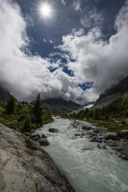 Pristine Mountain Stream Flowing Through Rocky Valley - Download Free Stock Images Pikwizard.com