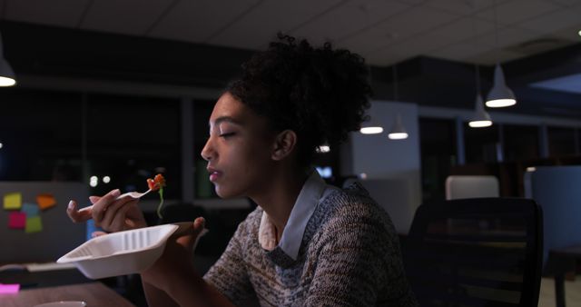 Young Professional Eating Late Night Dinner at Office - Download Free Stock Images Pikwizard.com