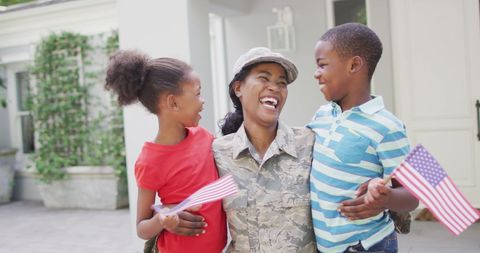 American Soldier Mother Embracing Her Joyful Children - Download Free Stock Images Pikwizard.com