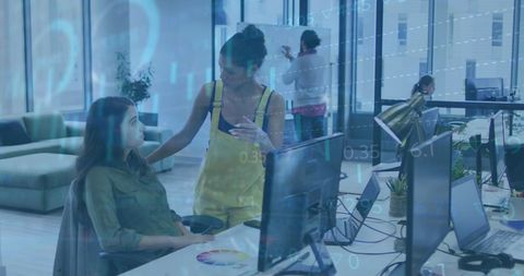 Diverse Women Collaborating in Modern Corporate Office with Overlayed Stock Market Data - Download Free Stock Images Pikwizard.com