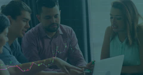 Collaborative Team Discussing Work with Financial Digital Overlay