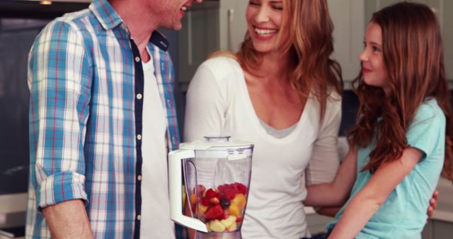 Happy Family Making Smoothies Together in Kitchen - Download Free Stock Images Pikwizard.com