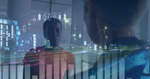 Coworkers discussing finance with overlaid digital graphs