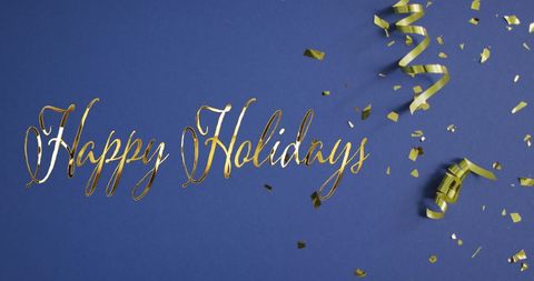 Festive happy holidays greeting with confetti on blue