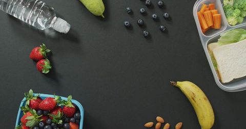 Healthy packed lunch with vegan food and fresh produce