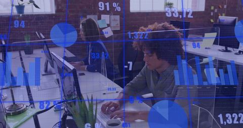 Diverse Professionals Working on Financial Data in Office