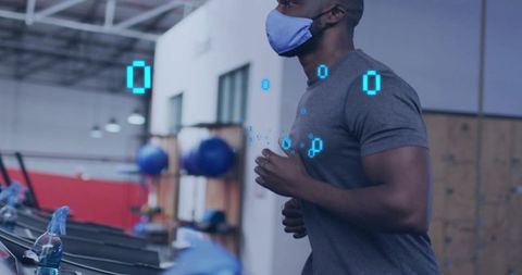 Jogging man wearing blue mask and gray shirt with biometric hud on treadmill in gym