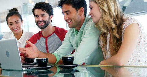 Group of Friends Enjoying Coffee and Laptop in Cafe - Download Free Stock Images Pikwizard.com