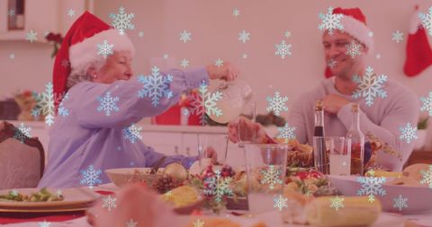 Christmas Family Dinner with Santa Hats and Snowfall Effect