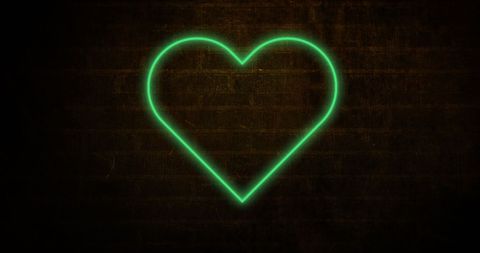 Neon Green Heart Glowing on Dark Brick Wall - Download Free Stock Images Pikwizard.com