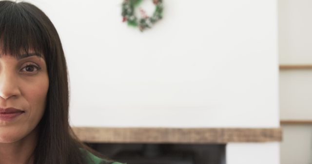 Woman with straight black hair in festive decorated room half face visible - Download Free Stock Images Pikwizard.com