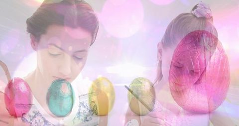 Mother and daughter decorating easter eggs with colorful overlay