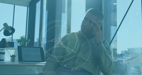 Business Professional Analyzing Data with Technological Overlays in Modern Office