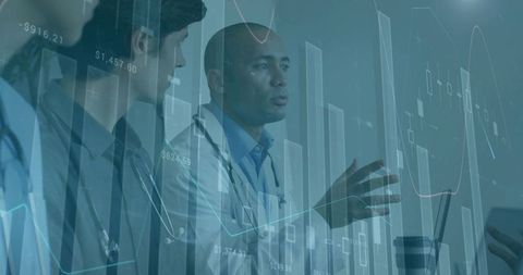 Medical Team Collaborating on Healthcare Analytics and Cost Management with Digital Charts