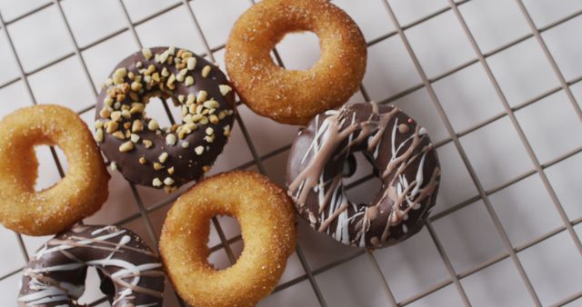 Assorted Donuts on Cooling Rack - Download Free Stock Images Pikwizard.com