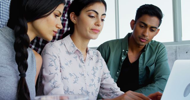 Focused Team Collaborating on Project Together in Modern Office - Download Free Stock Images Pikwizard.com