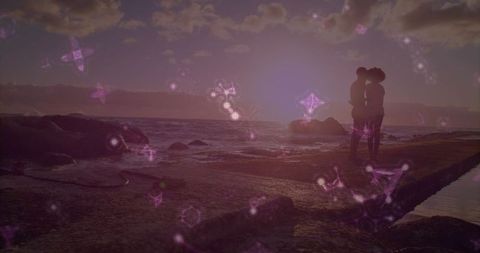 Silhouette of couple kissing on sunset jetty with purple lights