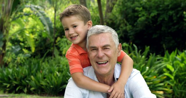 Grandfather and Grandson Enjoying Time in Garden - Download Free Stock Images Pikwizard.com