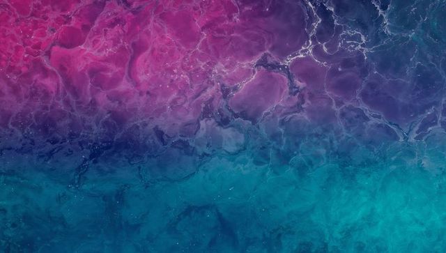 Magenta to teal marble gradient with flowing veins and painterly texture