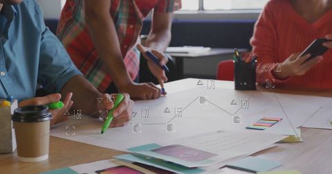 Diverse Team Brainstorming Business Ideas in Office