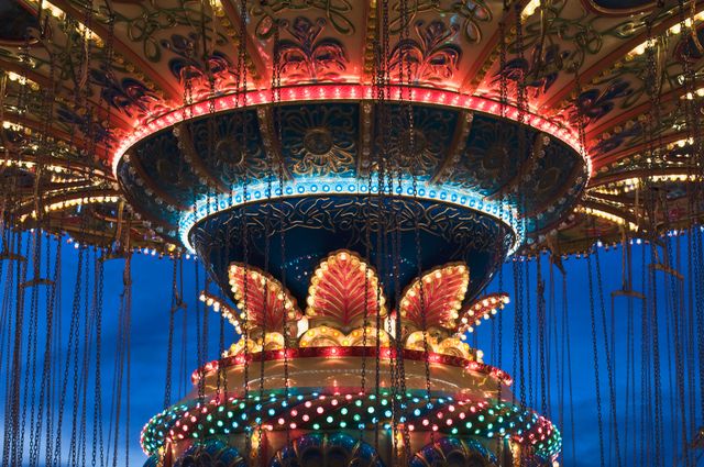 Colorful Carousel Swing Ride Illuminated at Night - Download Free Stock Photos Pikwizard.com