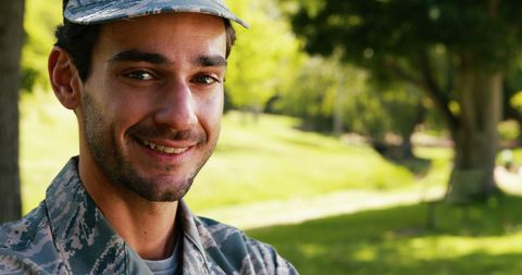 Smiling Soldier in Park on Sunny Day - Download Free Stock Images Pikwizard.com