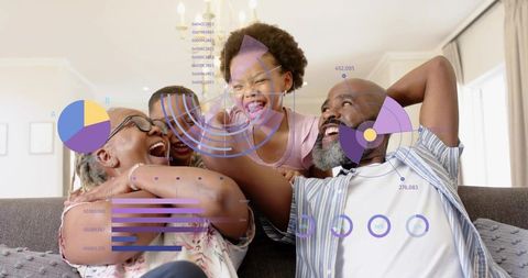 Multigenerational family laughing on couch with colorful data infographic overlays
