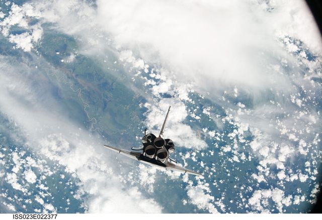 Space Shuttle Discovery Approaching International Space Station, 2010 - Download Free Stock Photos Pikwizard.com