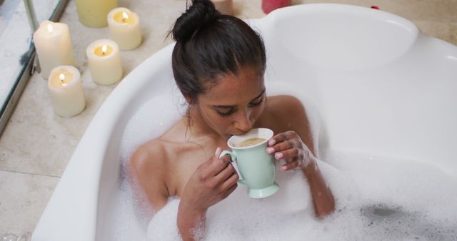 Young Woman Relaxing in Bubble Bath with Candlelight and Coffee - Download Free Stock Images Pikwizard.com