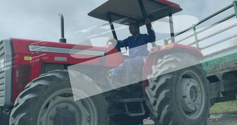 Farmer driving tractor with modern technology overlay
