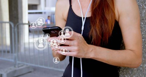Young Woman Engaging with Social Network on Smartphone Outdoors - Download Free Stock Images Pikwizard.com