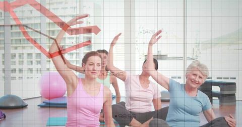 Group stretching class practicing seated side stretch improving mobility and balance