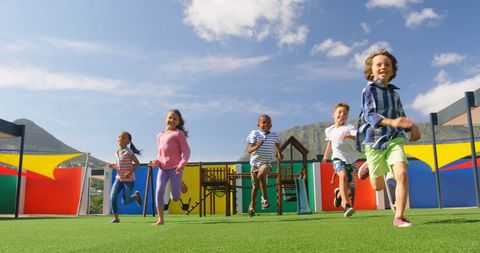 Children Enjoying Outdoor Playtime in School Playground - Download Free Stock Images Pikwizard.com