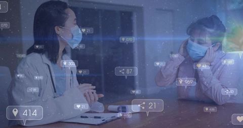 Masked doctor consulting patient at clinic desk with telehealth overlays and pulse oximeter