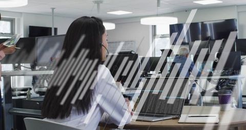 Businesswoman Communicating via Headset with Digital Overlay
