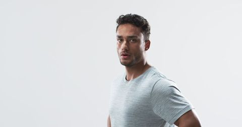 Young Biracial Athlete in Motion Exhibits Determination Against White Background - Download Free Stock Images Pikwizard.com