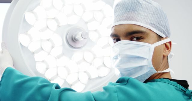 Surgeon Preparing Operating Room Light in Hospital - Download Free Stock Images Pikwizard.com