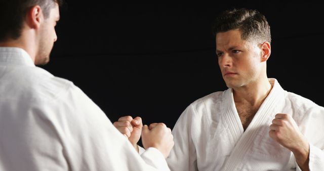 Martial Artists Sparring in Karate Training Session - Download Free Stock Images Pikwizard.com