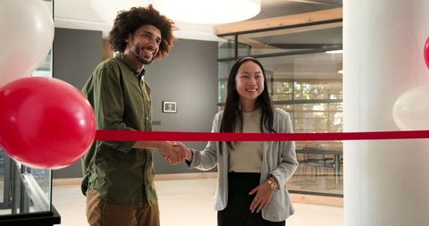 Diverse business partners launch new office opening ceremony