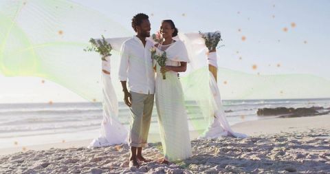 Elegant Beach Wedding Ceremony with Romantic Bride and Groom