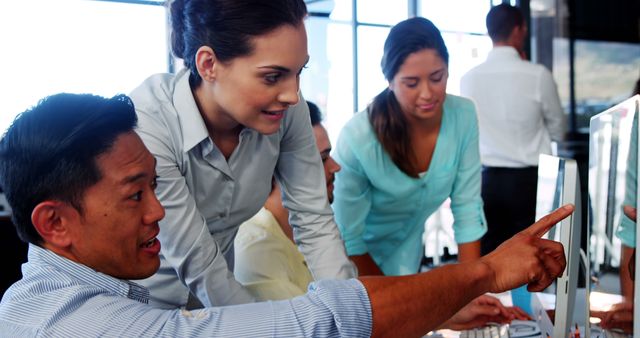 Professional Team Collaborating on Computer in Office - Download Free Stock Images Pikwizard.com