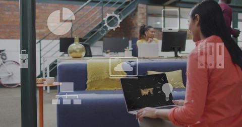 Woman Holding NFT Laptop in Modern Coworking Lounge Working on Digital Innovation