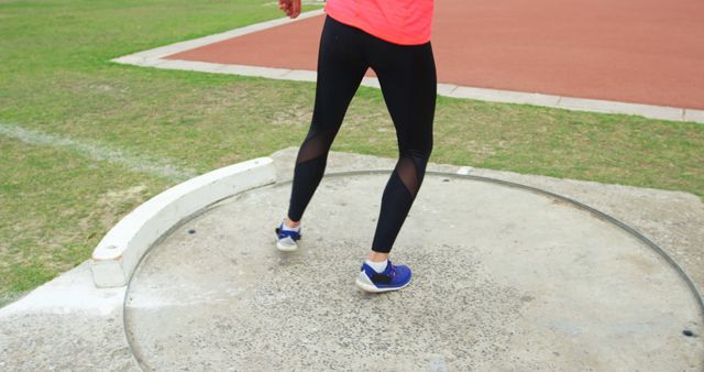 Athlete Preparing for Discus Throw in Outdoor Stadium - Download Free Stock Images Pikwizard.com