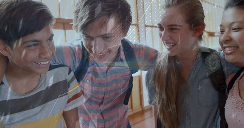 Teenage friends enjoying moments in school gymnasium