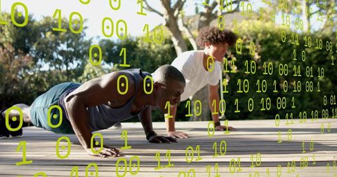 Two men doing push-ups on wooden deck with digital binary overlay representing fitness tech