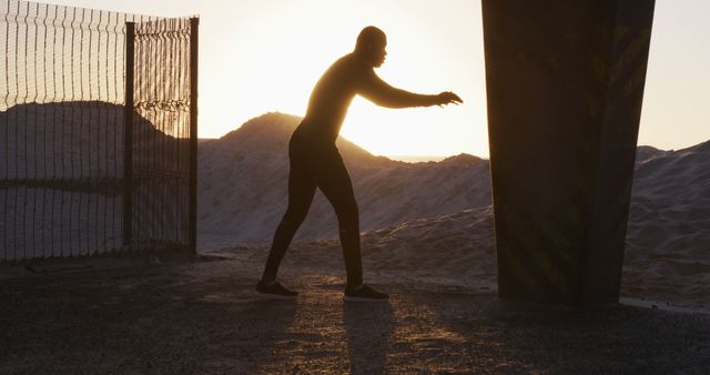 Human Silhouette in Desert Sunset Light - Download Free Stock Images Pikwizard.com